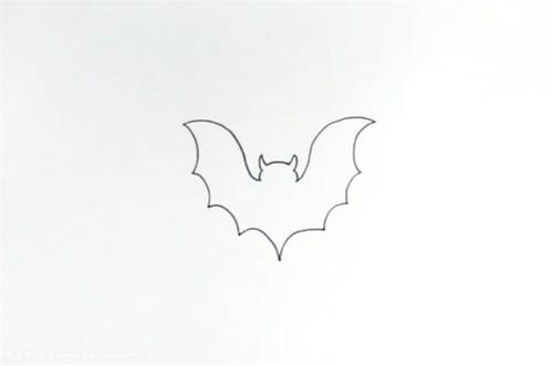 开始涂色啦给蝙蝠的全身涂上黑色这样万圣节蝙蝠简笔画就完成了